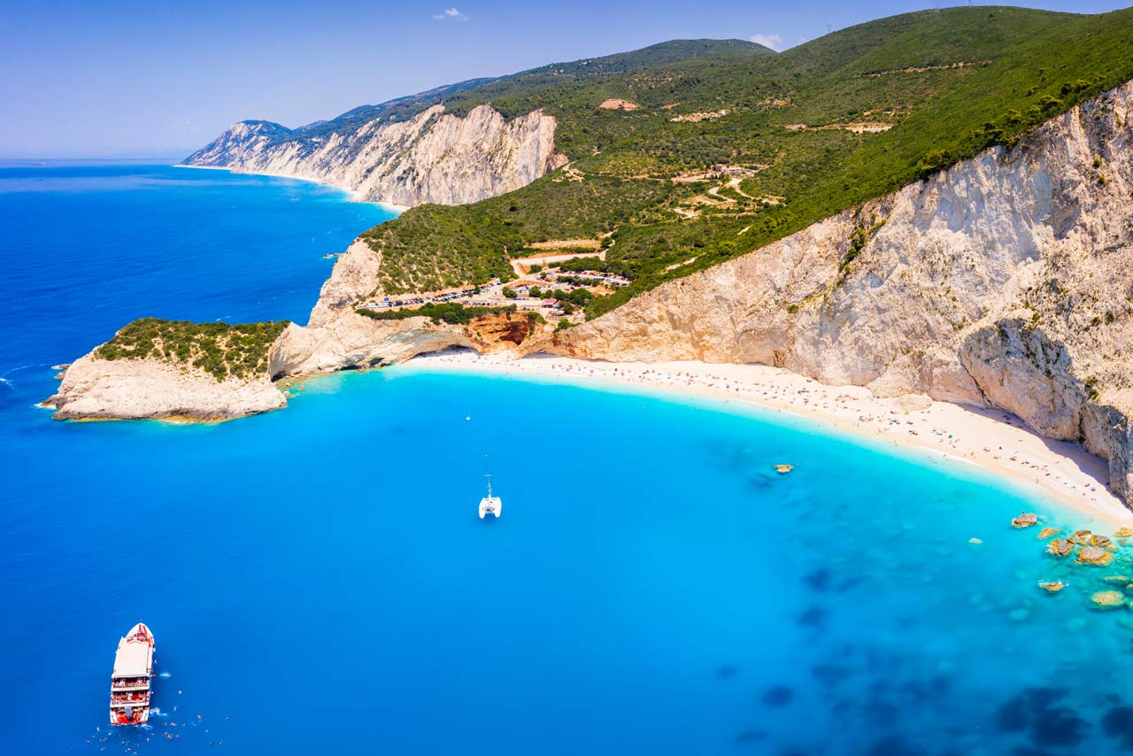 Aerial view of dramatic cliffs and turquoise beach on Lefkada island, Greece