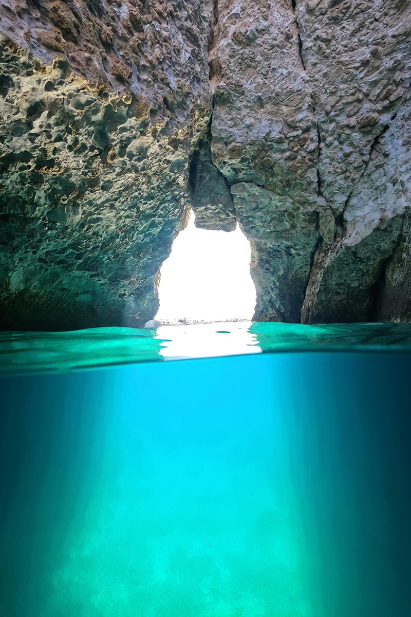 Sea cave stop on a Milos boat tour near Kleftiko